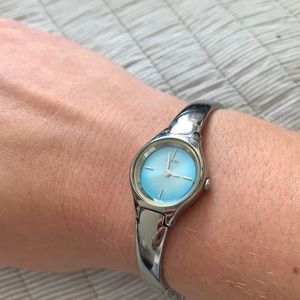 GUESS watch with blue watch face and extra link
